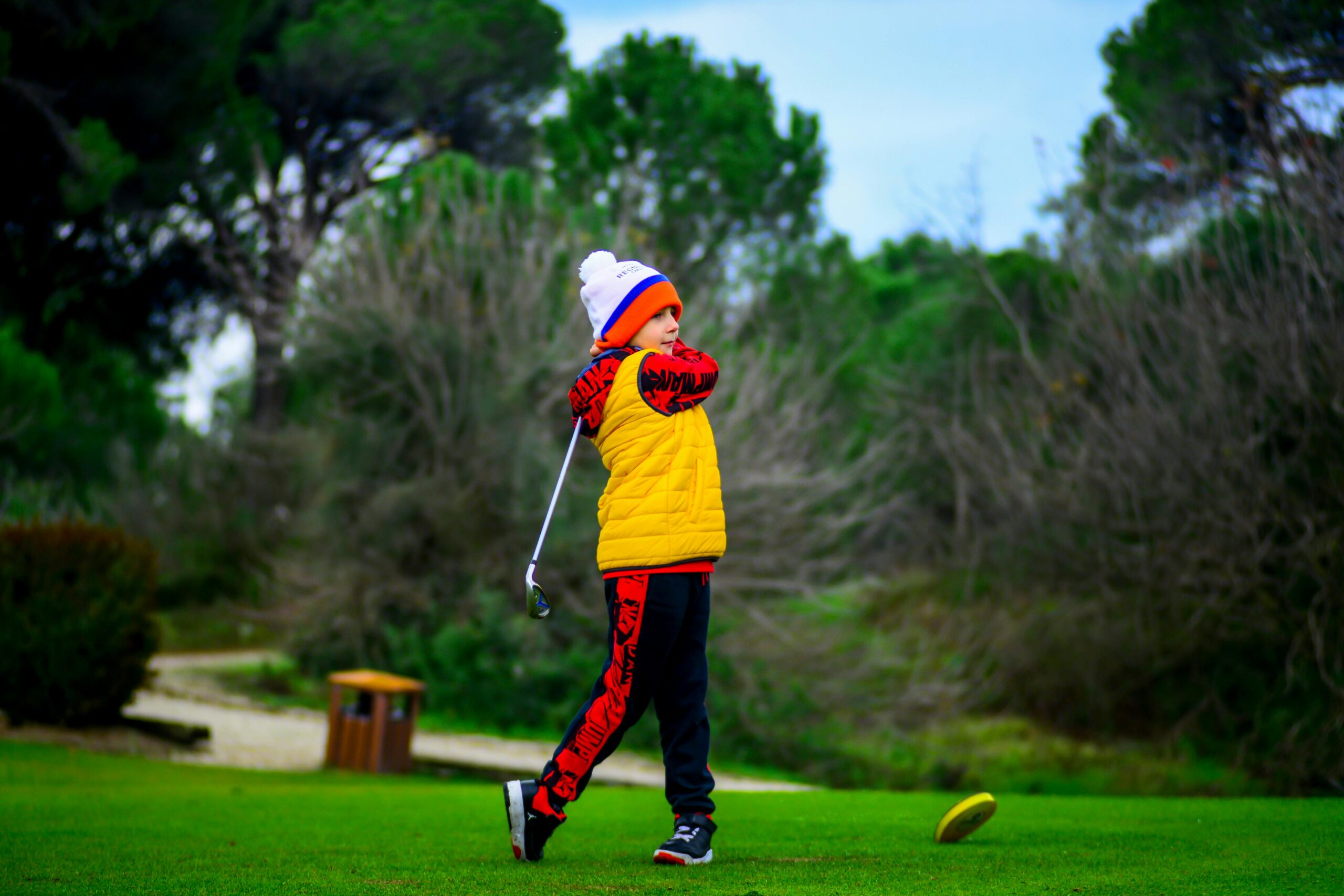 Junior golfer enjoying first round of golf